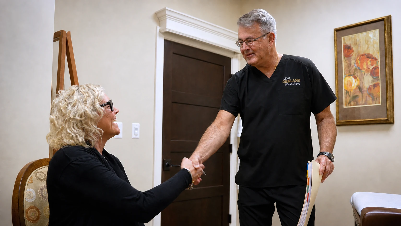 Dr. Richard Hainer greeting a patient in his office